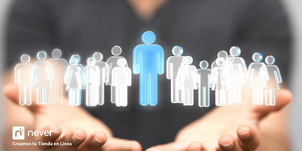 Manos sosteniendo iconos de figuras humanas, simbolizando la personalización en la tienda en línea. Never8, como agencia especializada en Adobe Commerce, puede implementar estrategias avanzadas de personalización para adaptar cada aspecto de la tienda a los intereses y comportamientos de los clientes, mejorando su experiencia y fortaleciendo su fidelidad.
