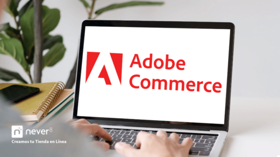 Laptop displaying the Adobe Commerce logo, highlighting its ability to create customized, scalable online stores. Never8 makes it easy to implement and manage this advanced e-commerce platform.